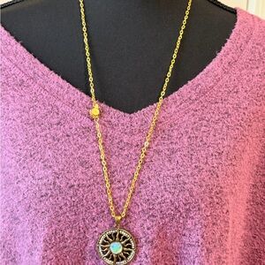 Gold Sunburst Pendant Necklace in Pink